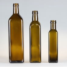 Empty Square light brown olive oil bottle with caps and shrink.